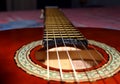 Close up of guitar strings. Brown classical guitar Royalty Free Stock Photo