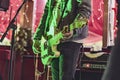 Close-up of Guitarist Playing Live in Small Venue Royalty Free Stock Photo