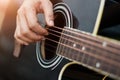 Close up. Guitarist on stage for background, hands playing acoustic guitar Royalty Free Stock Photo