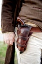 Close up of gun in a old western holster Royalty Free Stock Photo