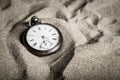 A close-up gusset watch in the sand Royalty Free Stock Photo