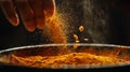 Close up of h adding spices to a pan