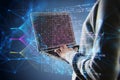 Close up of hacker hands using laptop with creative big data lines on dark background. Technology, hacking, malware and innovation Royalty Free Stock Photo