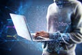 Close up of hacker hands using laptop keyboard with creative big data lines on dark background. Technology, hacking, malware and Royalty Free Stock Photo