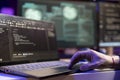 Close up of hacker using laptop, coding malware Royalty Free Stock Photo