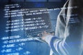 Close up of hacker using laptop with creative digital programming language on blurry background. Software developer, hacking, Royalty Free Stock Photo