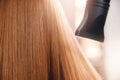 Close-up of hair dryer, concept cut salon, female stylist Royalty Free Stock Photo