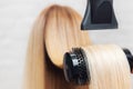 Close-up of hair dryer, concept cut salon, female stylist