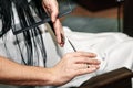 Close-up of a hairdresser cutting the hair of a woman in a beauty salon Royalty Free Stock Photo