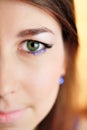 Close up half face portrait of a beautiful young woman Royalty Free Stock Photo