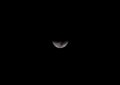 Close up of half moon in the dark sky Royalty Free Stock Photo