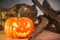 Close-up of halloween pumpkin on table, smoke background Royalty Free Stock Photo
