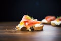 close-up of a halved bagel with cream cheese and lox Royalty Free Stock Photo