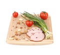 Close up of ham with nuts on board. Royalty Free Stock Photo