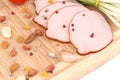 Close up of ham with nuts on board. Royalty Free Stock Photo