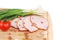 Close up of ham with nuts on board. Royalty Free Stock Photo