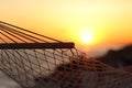 Close up of a hammock on the beach at sunset Royalty Free Stock Photo