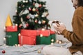 Close up hand of asian woman present open box Christmas gift at home. copy space Royalty Free Stock Photo