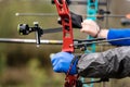 Archer Aiming with a Red Hunting Compound Bow Royalty Free Stock Photo
