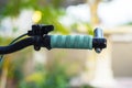 Close up hand brake mountain bike handle caliper bicycle blurred tree background for Exercise for health image