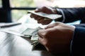 Close up hand. Business man counting money dollar on desk. Loans - personal financial insurance lifestyle real estate concept Royalty Free Stock Photo