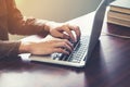 Close up hand business typing computer laptop in the office with Royalty Free Stock Photo