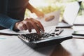 close up hand of business woman using calculator for working Royalty Free Stock Photo