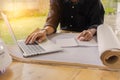 close up hand of business young man holding pen and using laptop Royalty Free Stock Photo