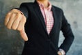 Close up of hand businesswoman thumb down