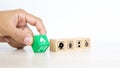 Close-up hand choose fire prevent symbol on wooden toy block stacked Royalty Free Stock Photo