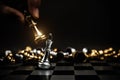 Close up hand choose king chess to challenge battle fighting on chess board