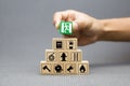 Close-up hand choose a wooden toy blocks with fire exit icon Royalty Free Stock Photo