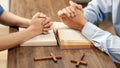 Close up hand. Christian women and men join hands in praying for Jesus` blessings to show love and confession of their sins