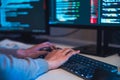 close up hand developer devops coding software data working at night in office