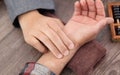 A close-up of the hand of a doctor of traditional Chinese Medicine