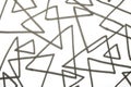 Close up of hand drawn doodle pen triangle square black lines and waves on white background Royalty Free Stock Photo