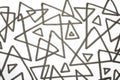 Close up of hand drawn doodle pen triangle square black lines and waves on white background Royalty Free Stock Photo