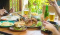 Close up hand, eating.Group Of People Dining Concept,With Chicken roasting Royalty Free Stock Photo