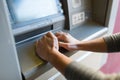 Close up of hand entering pin code at atm machine Royalty Free Stock Photo