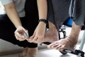 Close up,Hand of female hold a nail clipper,cutting the ingrown nail for senior grandmother,asian caregiver help to cut the toe Royalty Free Stock Photo