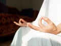 Close up Hand Gesture of Woman in white robe Doing Lotus Yoga Position, an Activity to Stay Physically, Mentally and Spiritually Royalty Free Stock Photo