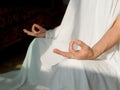 Close up Hand Gesture of Woman in white robe Doing Lotus Yoga Position, an Activity to Stay Physically, Mentally and Spiritually Royalty Free Stock Photo