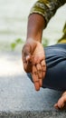 hand of a girl in yoga position