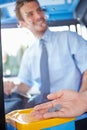 Close Up Of Hand Giving Driver Fare For Bus Journey Royalty Free Stock Photo