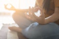 Close up hand and half body of healthy woman sit in lotus Yoga position.Young healthy woman sitting posture exercise in home. Royalty Free Stock Photo