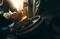 Close up hand heavy industrial worker is working on metal work factory process by Cutting sheet steel with gas cutting machine Royalty Free Stock Photo