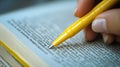 Close-up of hand highlighting text in book Royalty Free Stock Photo