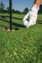 Close-up hand hold golf ball