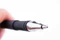 Close up of a hand holding a Ballpoint pen Royalty Free Stock Photo