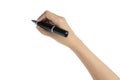Close up of hand holding black magic marker pen ready to writing something isolated on white background with copy space
